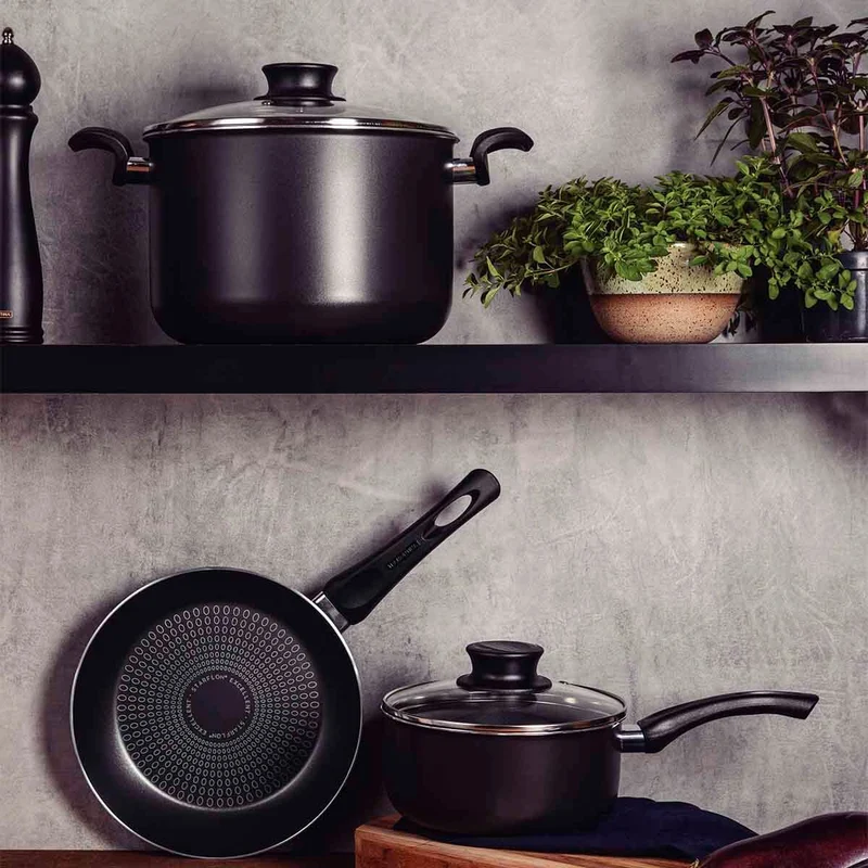 Batería cocina paris en aluminio con antiadherente negro 7 piezas Tramontina