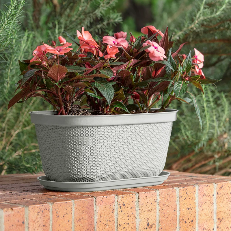 Matera ovalada rafia 40 cm con plato Rimax
